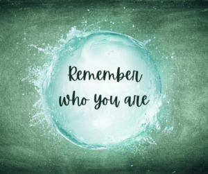 Motivational quote “Remember who you are” inside a splash of water, symbolizing awakening, identity, and inner healing through psilocybin retreats and safe psilocybin treatment.