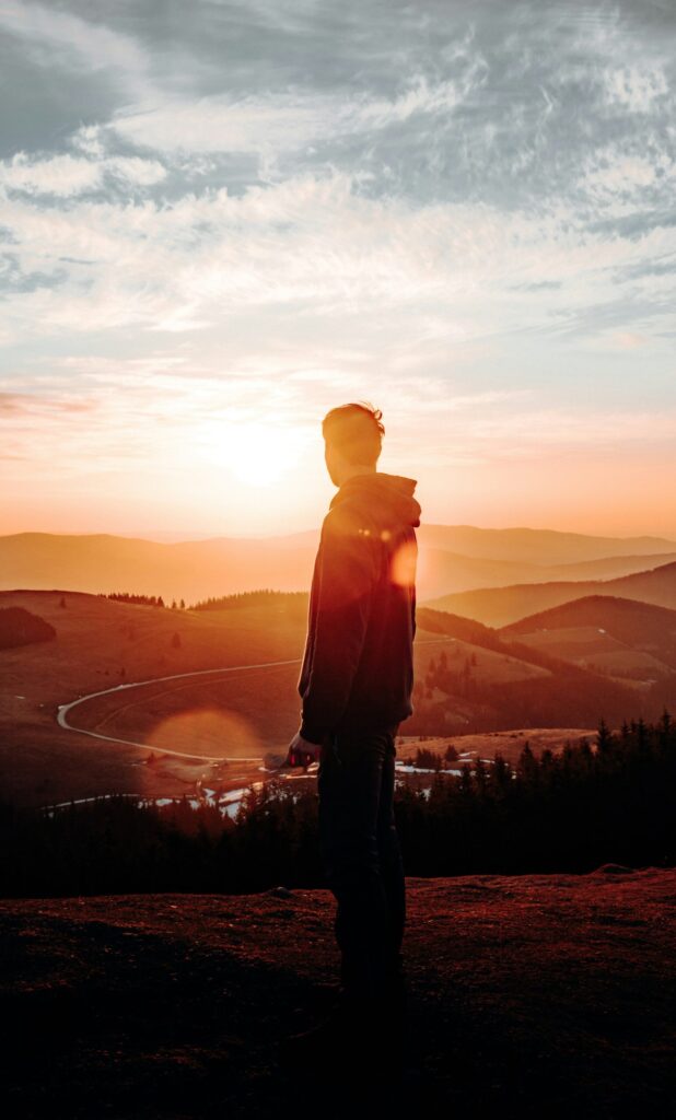 Individual reflecting in nature after a psilocybin experience in Oregon