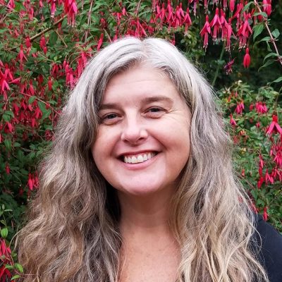 Spring Andersen, compassionate psilocybin facilitator in Oregon, specializing in addiction, depression, PTSD, trauma, and spiritual healing with shamanic expertise